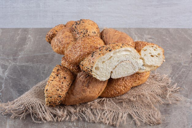 Half-loaves of strucia bread marble background. High quality photo