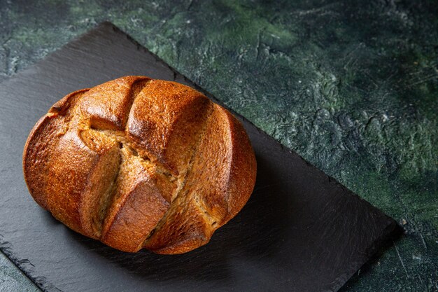 Half-top view fresh delicious bread on dark desk