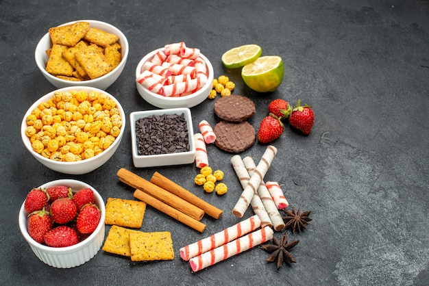 Half-top view tasty snacks with vaious crackers fresh fruits