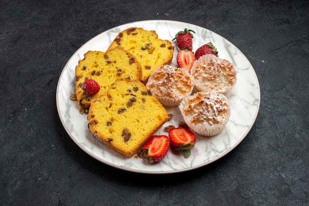 Half-top view yummy cake slices with fresh red strawberries and cookies on grey surface cake bake biscuit pie sugar sweet cookies