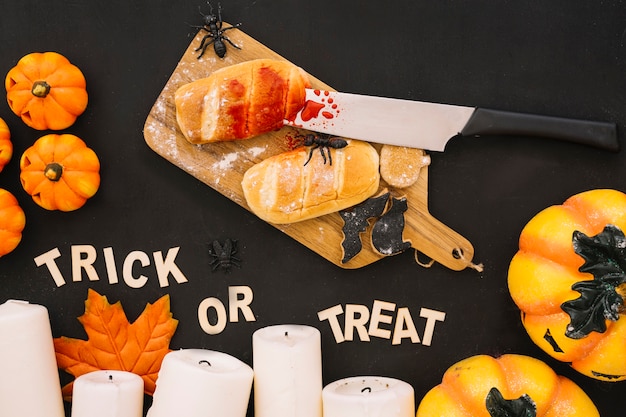 Halloween composition with bloody bread