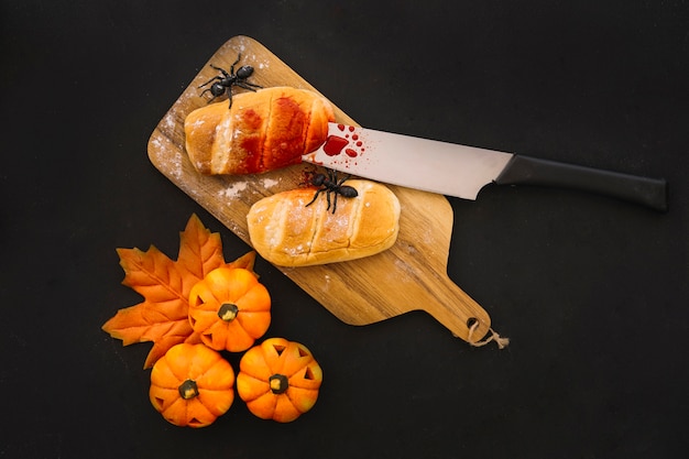 Halloween composition with bread and blood
