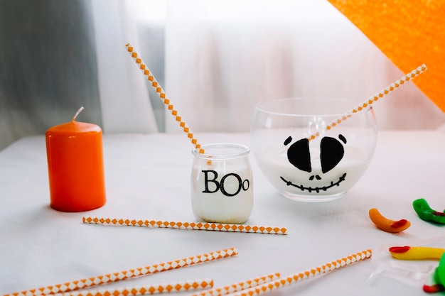 Free photo halloween composition with cocktail tubes