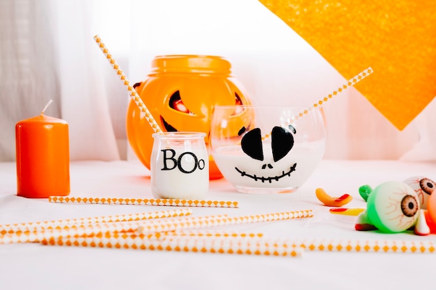 Halloween decorated table with cocktail tubes