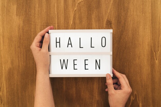 Halloween decoration with sign and hands