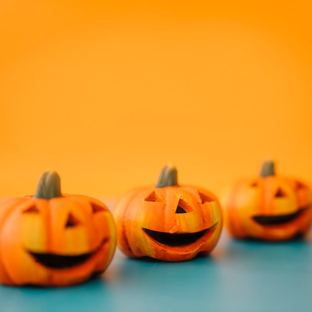 Halloween decoration with three friendly pumpkins