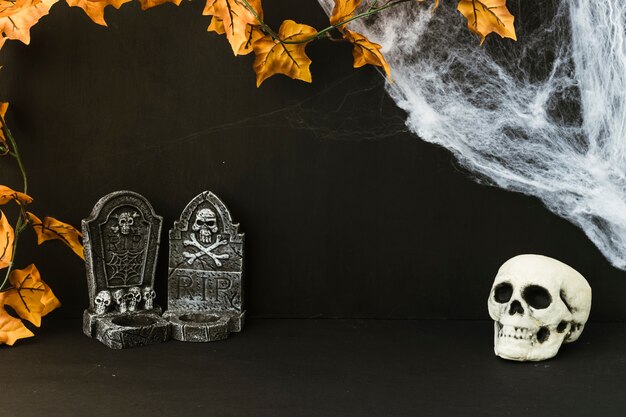 Halloween decoration with tombstones and skull