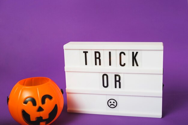 Halloween fake pumpkin and plastic board