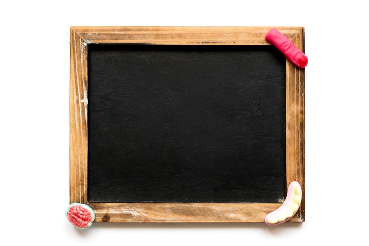 Free Photo halloween gummies on blackboard