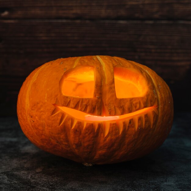 Halloween Jack-O-Lantern illuminating by candle from within