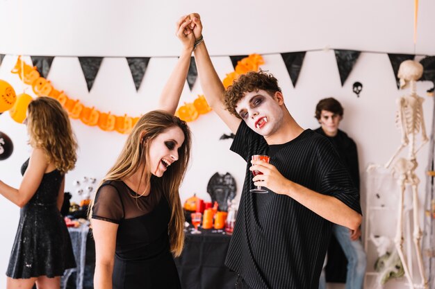 Halloween party with vampires dancing