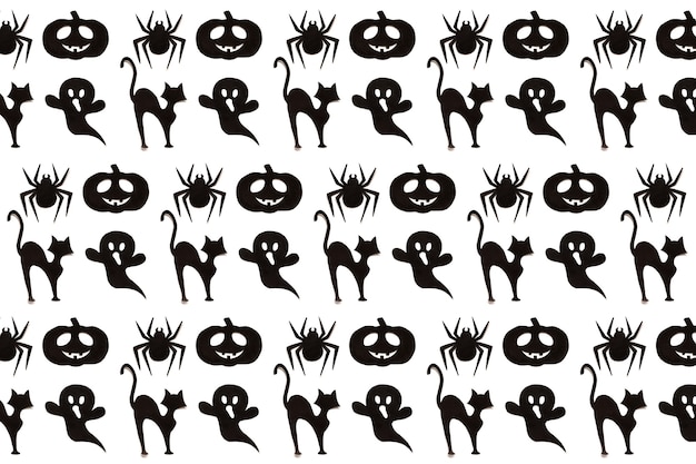 Шаблон хэллоуина. сборник мультфильмов черный на белом фоне. бумажное искусство. концепция праздника счастливого хэллоуина.