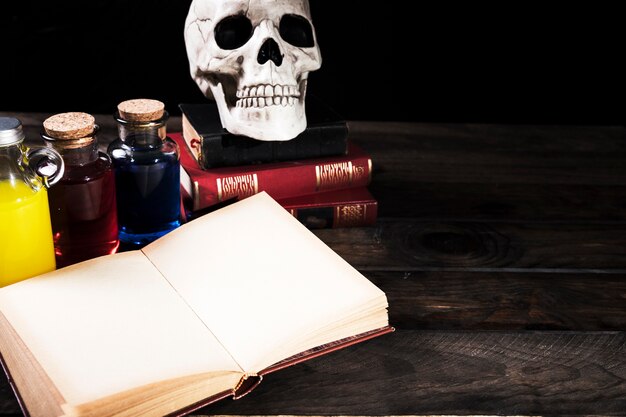 Halloween potions and books on desk