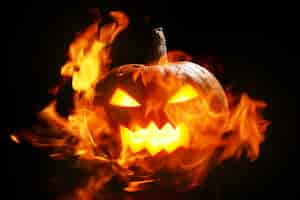 Free photo halloween pumpkin in fire