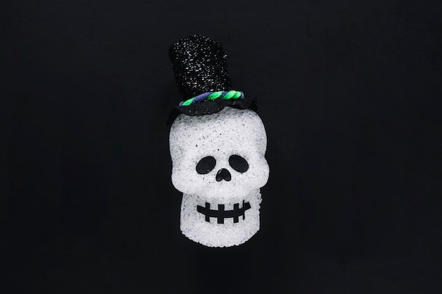 Halloween skull in black hat