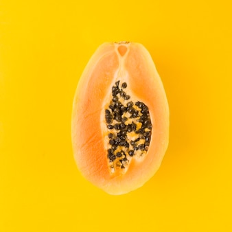 Free Photo Halved Papaya Fruit On Yellow Background free-photo-halved-papaya-fruit-on-yellow-background