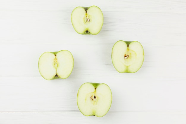 Halves apples on white background