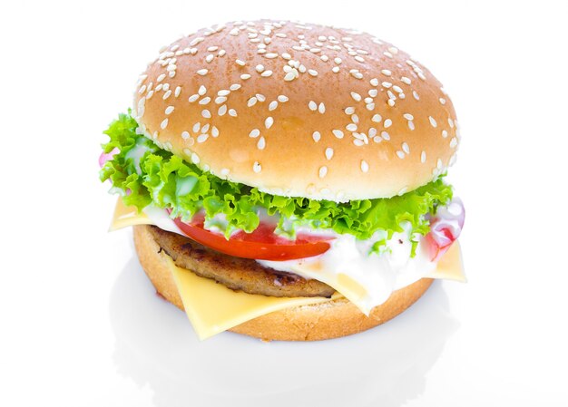 Hamburger with cheese, lettuce and tomatoes