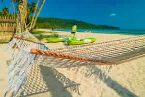 Free photo hammock  with beautiful nature tropical beach