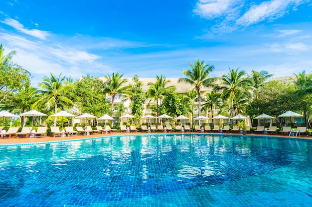 Free photo hammocks and umbrellas seen from the pool