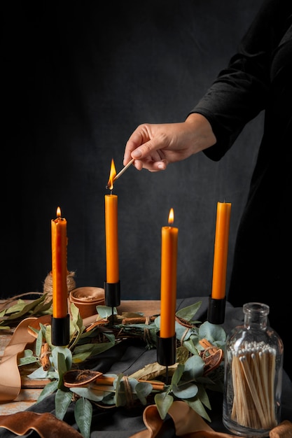 Free photo hand assembling advent wreath