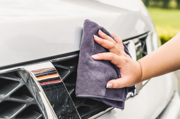 Free photo hand cleaning a car close