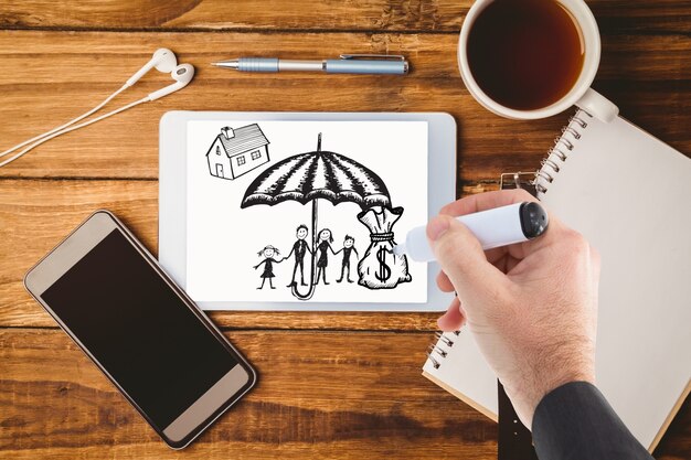 Hand drawing an umbrella on a tablet