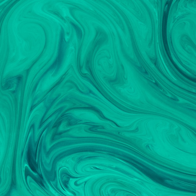 Free photo hand drawn abstract swirl green background