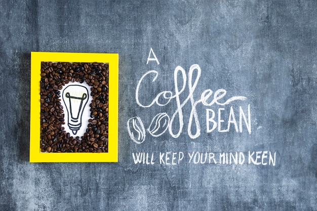 Hand drawn light bulb and coffee beans frame with text on chalkboard