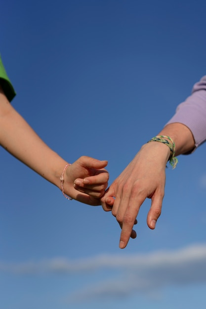 Hand gestures representing friendship