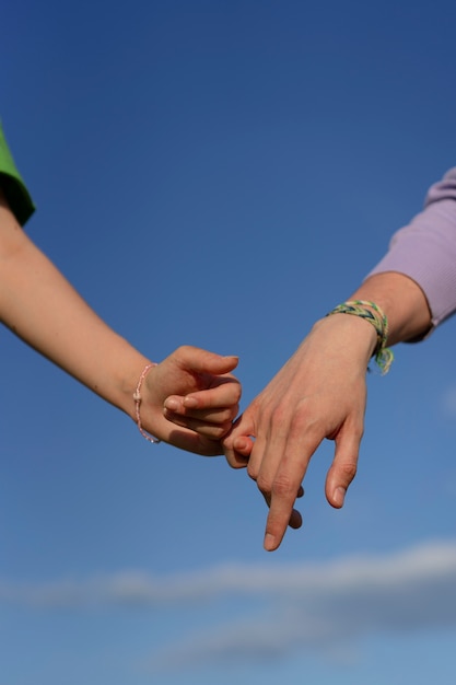 hand gestures representing friendship