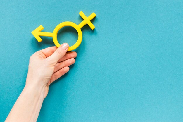 hand holding colorful equality symbol