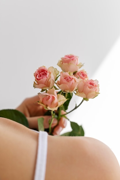 Hand holding elegant flower