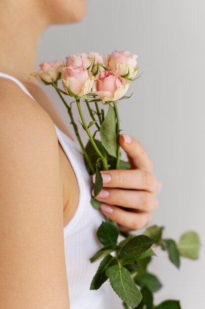 Hand holding elegant flower