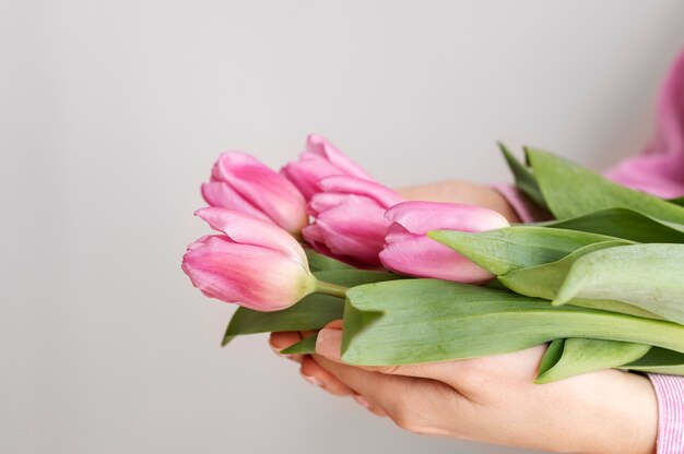 Hand holding elegant flower