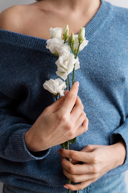 Hand holding elegant flower