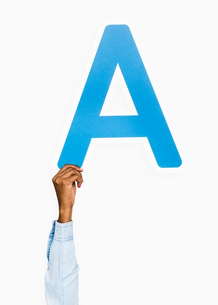 Free photo hand holding the letter a