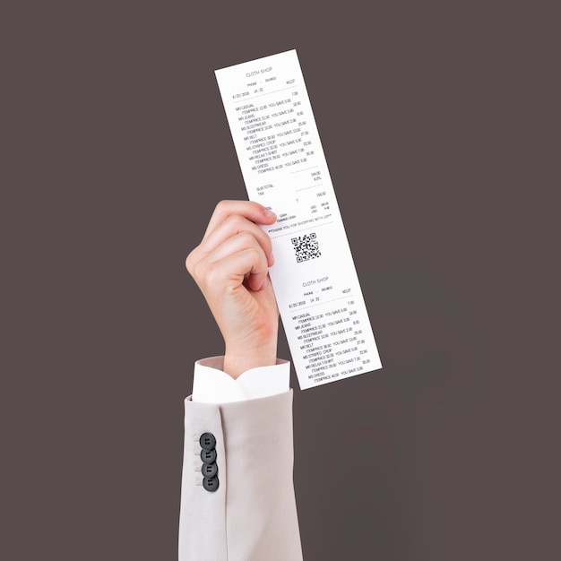 Free photo hand holding receipt for shopping campaign