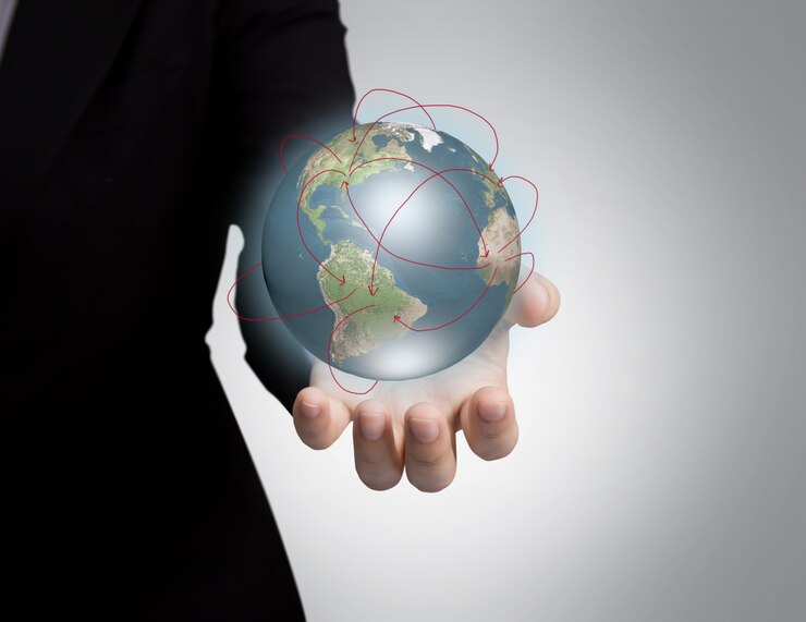 Free Photo hand holding a shiny planet earth