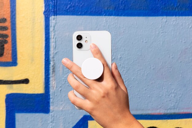 hand holding smartphone back view