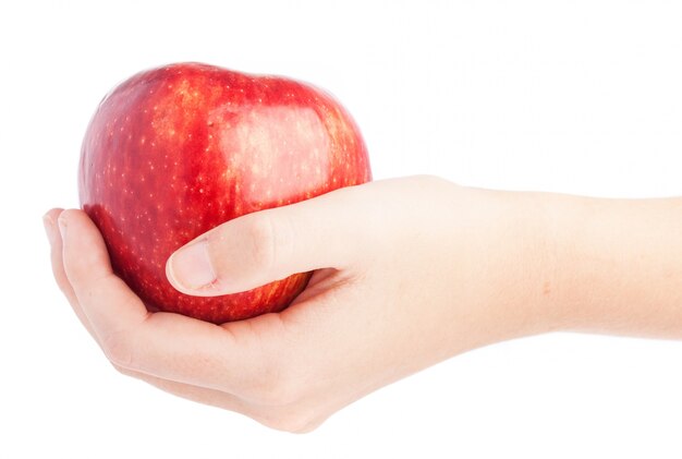 Hand holding a tasty apple
