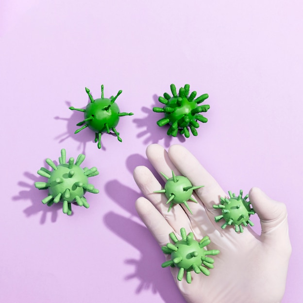 Hand holding virus bacterias