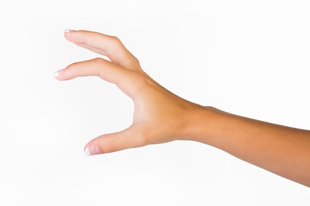 Hand indicating medium amount with fingers