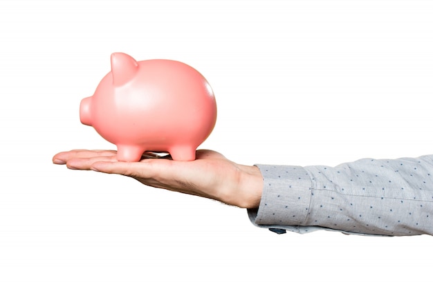 Free photo hand of man holding holding a piggybank