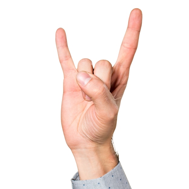 Free photo hand of man making horn gesture