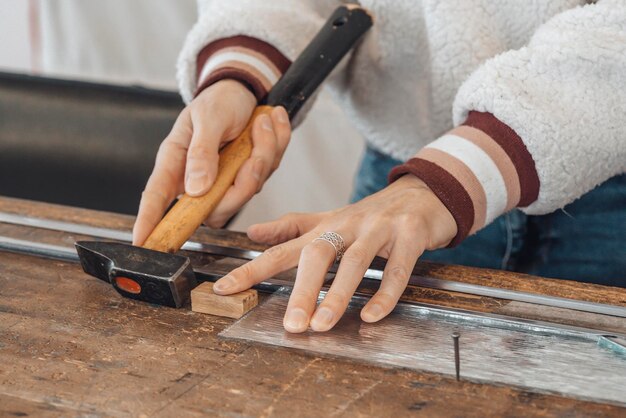 hand of master glassmaker in a workshop