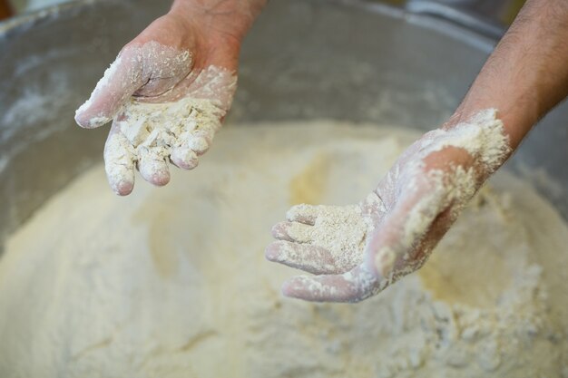 Hand mixing flour