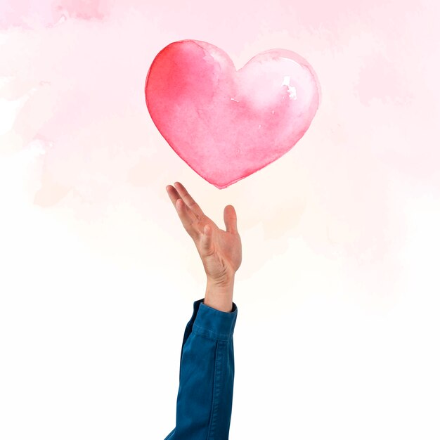 Рука, представляя сердце для акварельной иллюстрации празднования Валентина