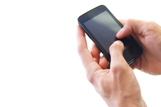 Hand's detail of Businessman  using a samrtphone