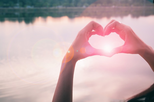 Hand in shape of love heart